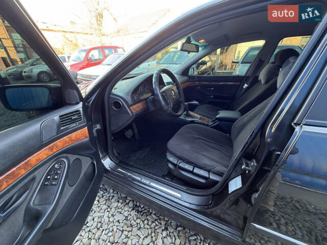 Черный БМВ 5 Серия, объемом двигателя 2.5 л и пробегом 300 тыс. км за 2900 $, фото 9 на Automoto.ua