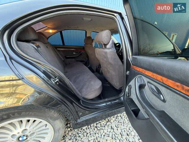 Черный БМВ 5 Серия, объемом двигателя 2.5 л и пробегом 300 тыс. км за 2900 $, фото 13 на Automoto.ua