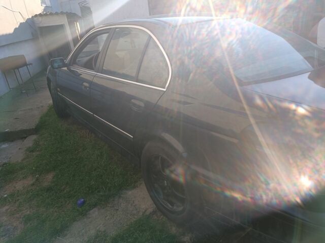 Черный БМВ 5 Серия, объемом двигателя 2 л и пробегом 200 тыс. км за 1900 $, фото 3 на Automoto.ua