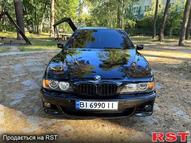 Черный БМВ 5 Серия, объемом двигателя 2.5 л и пробегом 350 тыс. км за 4500 $, фото 1 на Automoto.ua