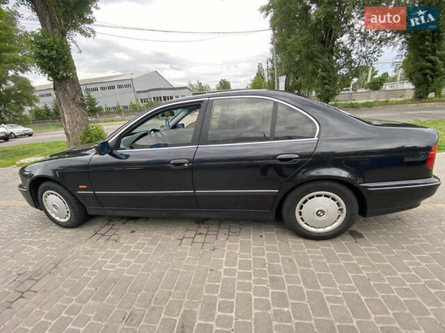 Черный БМВ 5 Серия, объемом двигателя 2.5 л и пробегом 324 тыс. км за 4700 $, фото 3 на Automoto.ua