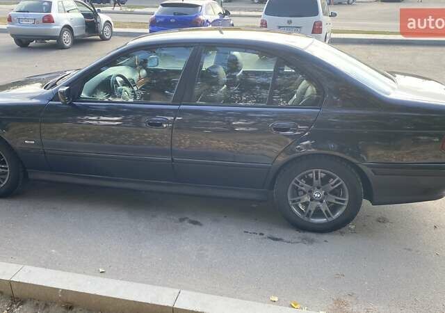 Черный БМВ 5 Серия, объемом двигателя 2.8 л и пробегом 465 тыс. км за 4500 $, фото 5 на Automoto.ua