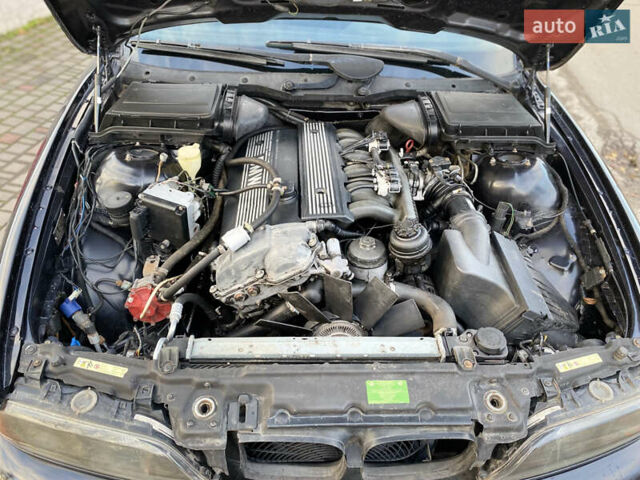 Черный БМВ 5 Серия, объемом двигателя 2.8 л и пробегом 282 тыс. км за 5500 $, фото 12 на Automoto.ua