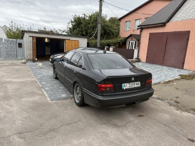 Черный БМВ 5 Серия, объемом двигателя 2.5 л и пробегом 460 тыс. км за 3500 $, фото 2 на Automoto.ua