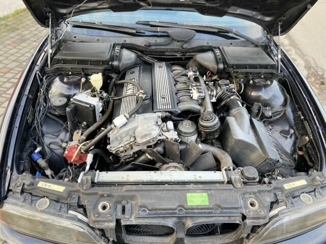 Черный БМВ 5 Серия, объемом двигателя 2.8 л и пробегом 282 тыс. км за 5500 $, фото 14 на Automoto.ua