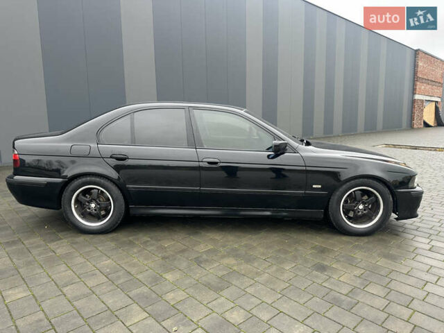 Черный БМВ 5 Серия, объемом двигателя 2.5 л и пробегом 460 тыс. км за 4800 $, фото 6 на Automoto.ua