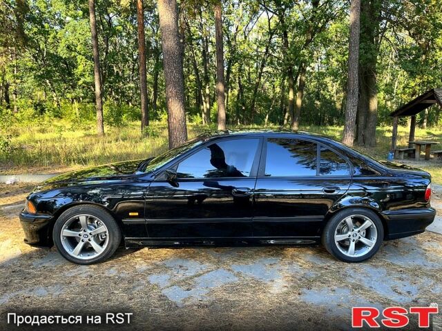 Черный БМВ 5 Серия, объемом двигателя 2.5 л и пробегом 350 тыс. км за 4500 $, фото 5 на Automoto.ua