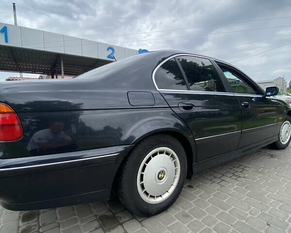 Черный БМВ 5 Серия, объемом двигателя 2.5 л и пробегом 324 тыс. км за 4700 $, фото 1 на Automoto.ua