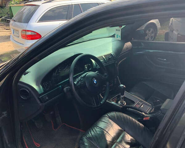 Черный БМВ 5 Серия, объемом двигателя 2.5 л и пробегом 305 тыс. км за 4500 $, фото 5 на Automoto.ua