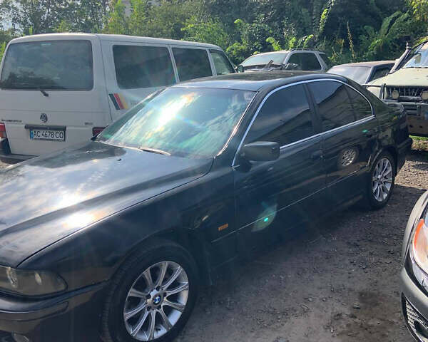 Черный БМВ 5 Серия, объемом двигателя 2.5 л и пробегом 305 тыс. км за 4500 $, фото 1 на Automoto.ua