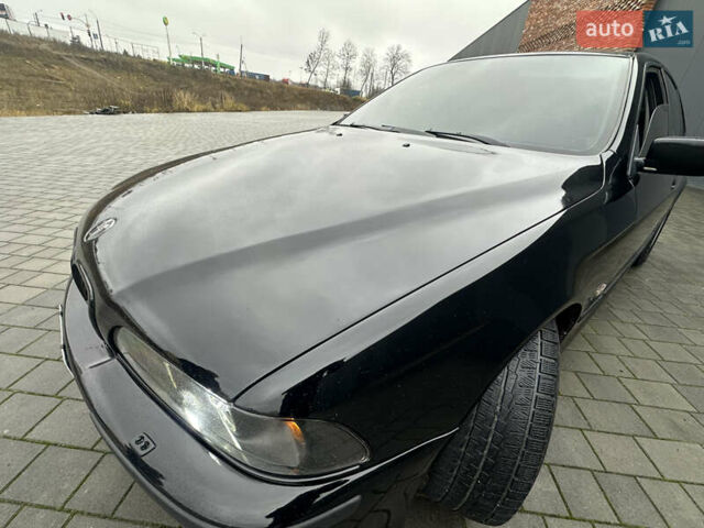 Черный БМВ 5 Серия, объемом двигателя 2.5 л и пробегом 460 тыс. км за 4800 $, фото 11 на Automoto.ua