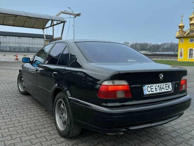 Черный БМВ 5 Серия, объемом двигателя 2.5 л и пробегом 400 тыс. км за 4300 $, фото 1 на Automoto.ua