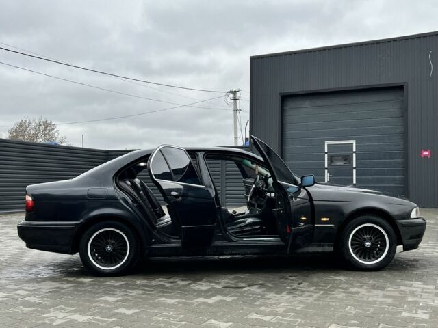 Чорний БМВ 5 Серія, об'ємом двигуна 2 л та пробігом 400 тис. км за 2700 $, фото 6 на Automoto.ua