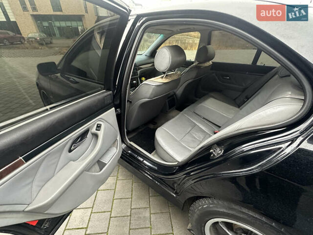 Черный БМВ 5 Серия, объемом двигателя 2.5 л и пробегом 460 тыс. км за 4800 $, фото 18 на Automoto.ua