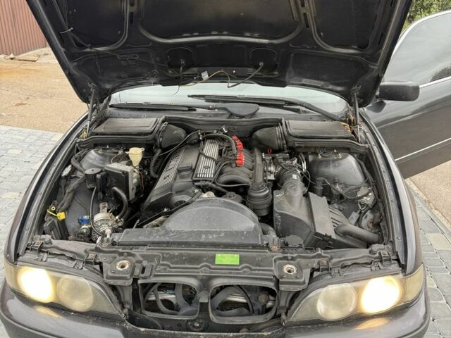 Черный БМВ 5 Серия, объемом двигателя 2.5 л и пробегом 460 тыс. км за 3500 $, фото 7 на Automoto.ua