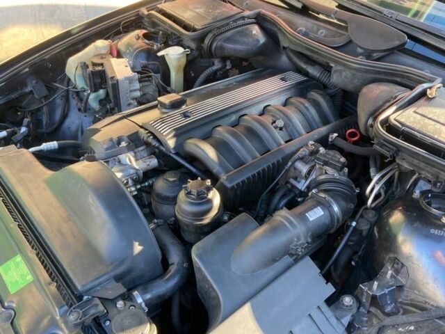 Черный БМВ 5 Серия, объемом двигателя 2.8 л и пробегом 150 тыс. км за 5600 $, фото 22 на Automoto.ua