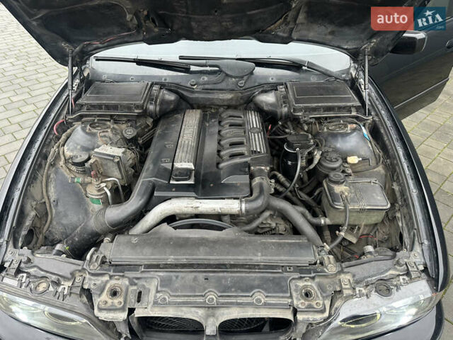 Черный БМВ 5 Серия, объемом двигателя 2.5 л и пробегом 460 тыс. км за 4800 $, фото 20 на Automoto.ua