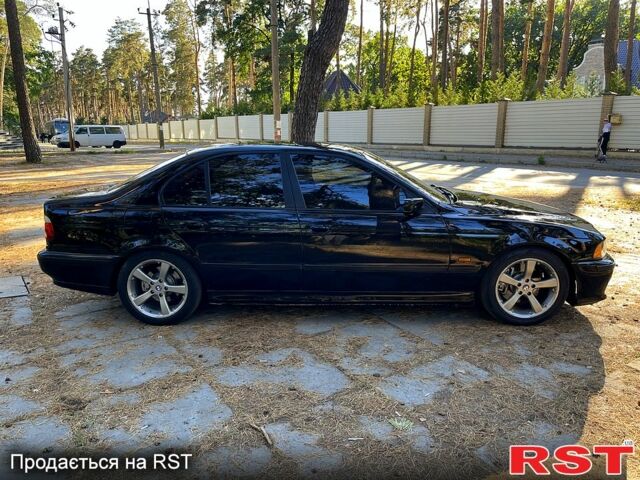 Черный БМВ 5 Серия, объемом двигателя 2.5 л и пробегом 350 тыс. км за 4500 $, фото 2 на Automoto.ua