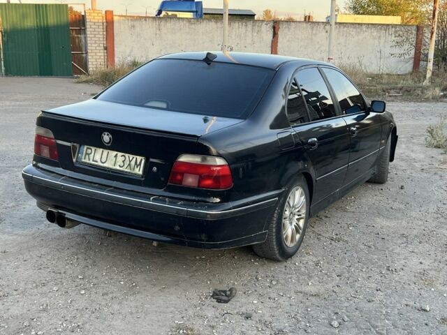 Черный БМВ 5 Серия, объемом двигателя 2.8 л и пробегом 280 тыс. км за 2600 $, фото 5 на Automoto.ua
