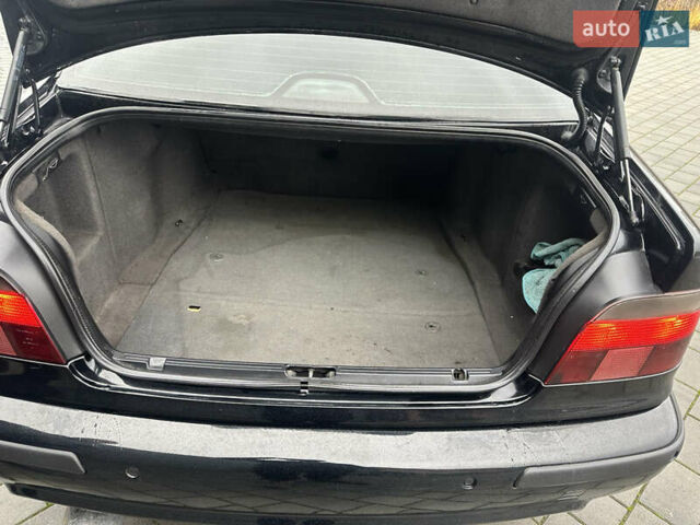 Черный БМВ 5 Серия, объемом двигателя 2.5 л и пробегом 460 тыс. км за 4800 $, фото 19 на Automoto.ua