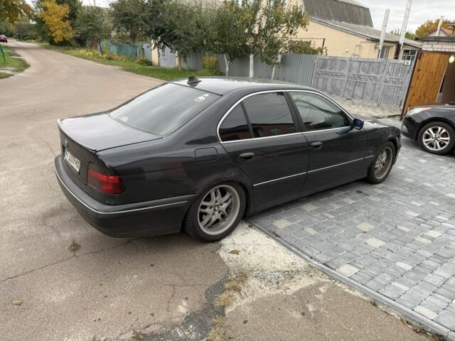 Черный БМВ 5 Серия, объемом двигателя 2.5 л и пробегом 460 тыс. км за 3500 $, фото 1 на Automoto.ua