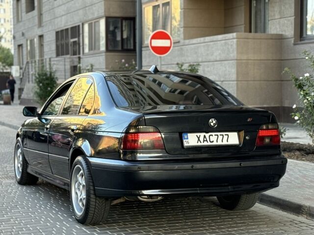 Черный БМВ 5 Серия, объемом двигателя 2.5 л и пробегом 500 тыс. км за 5000 $, фото 4 на Automoto.ua