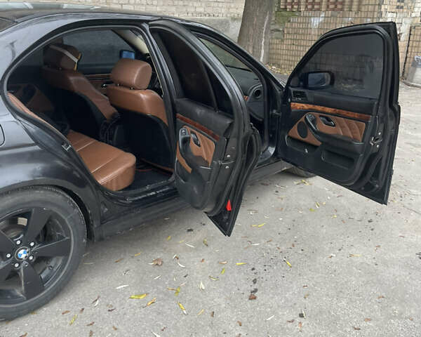 Чорний БМВ 5 Серія, об'ємом двигуна 2.5 л та пробігом 288 тис. км за 4600 $, фото 1 на Automoto.ua