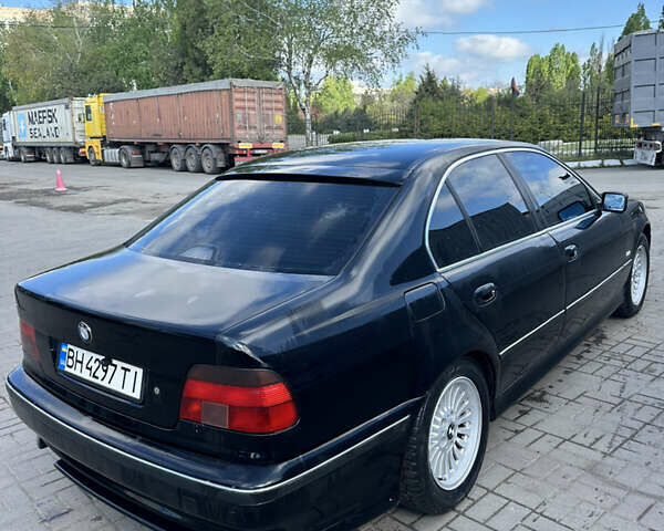 Черный БМВ 5 Серия, объемом двигателя 2 л и пробегом 460 тыс. км за 3100 $, фото 10 на Automoto.ua