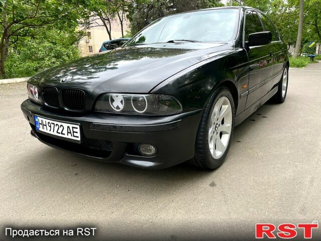 Черный БМВ 5 Серия, объемом двигателя 2.8 л и пробегом 477 тыс. км за 3950 $, фото 1 на Automoto.ua