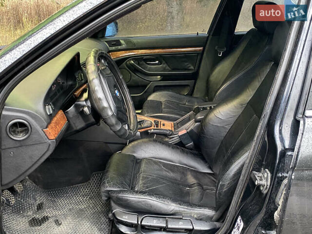 Черный БМВ 5 Серия, объемом двигателя 2.79 л и пробегом 300 тыс. км за 4400 $, фото 23 на Automoto.ua