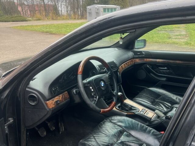 Черный БМВ 5 Серия, объемом двигателя 2.8 л и пробегом 366 тыс. км за 3750 $, фото 12 на Automoto.ua