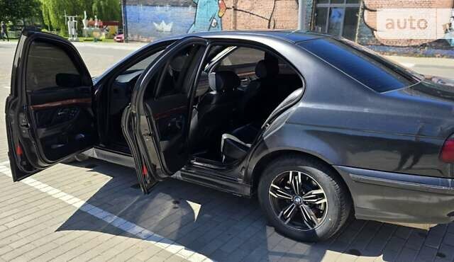Черный БМВ 5 Серия, объемом двигателя 2.8 л и пробегом 330 тыс. км за 3300 $, фото 12 на Automoto.ua