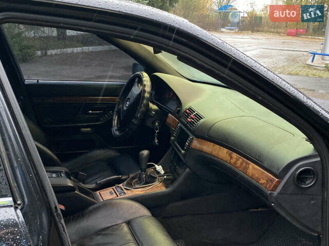 Черный БМВ 5 Серия, объемом двигателя 2.79 л и пробегом 300 тыс. км за 4400 $, фото 28 на Automoto.ua