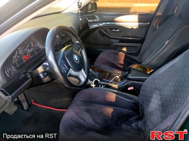 Черный БМВ 5 Серия, объемом двигателя 2 л и пробегом 392 тыс. км за 5000 $, фото 1 на Automoto.ua