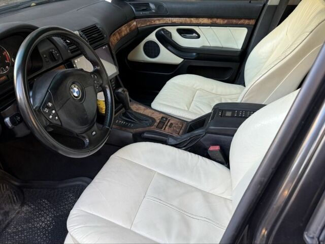 Черный БМВ 5 Серия, объемом двигателя 2.5 л и пробегом 500 тыс. км за 5000 $, фото 6 на Automoto.ua