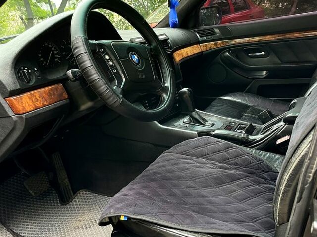 Черный БМВ 5 Серия, объемом двигателя 2.8 л и пробегом 477 тыс. км за 3950 $, фото 5 на Automoto.ua