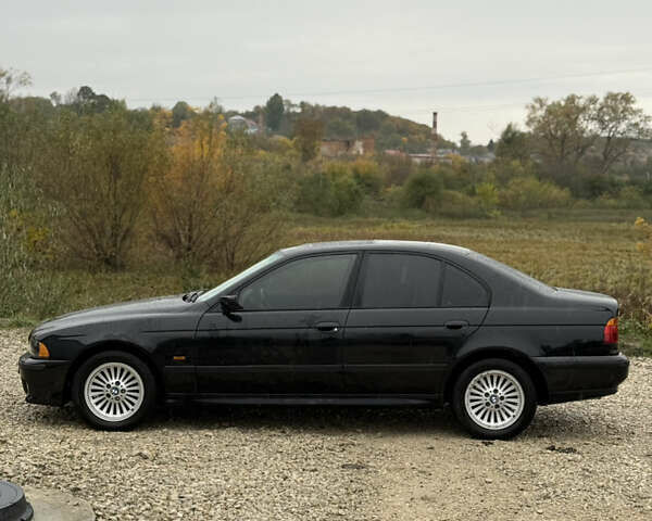 Черный БМВ 5 Серия, объемом двигателя 3 л и пробегом 400 тыс. км за 5950 $, фото 6 на Automoto.ua