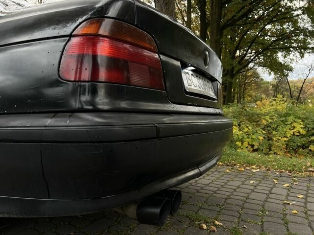 Черный БМВ 5 Серия, объемом двигателя 2.5 л и пробегом 299 тыс. км за 2999 $, фото 10 на Automoto.ua