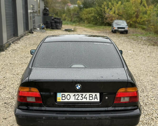 Черный БМВ 5 Серия, объемом двигателя 3 л и пробегом 400 тыс. км за 5950 $, фото 5 на Automoto.ua