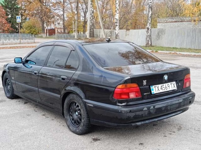 Черный БМВ 5 Серия, объемом двигателя 2.5 л и пробегом 320 тыс. км за 1850 $, фото 5 на Automoto.ua