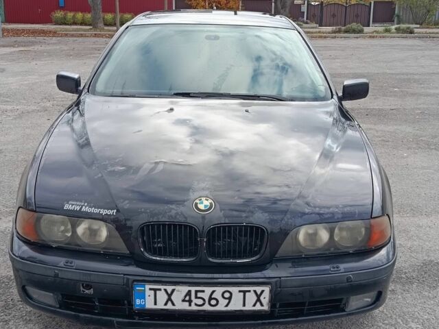 Черный БМВ 5 Серия, объемом двигателя 2.5 л и пробегом 320 тыс. км за 1850 $, фото 1 на Automoto.ua