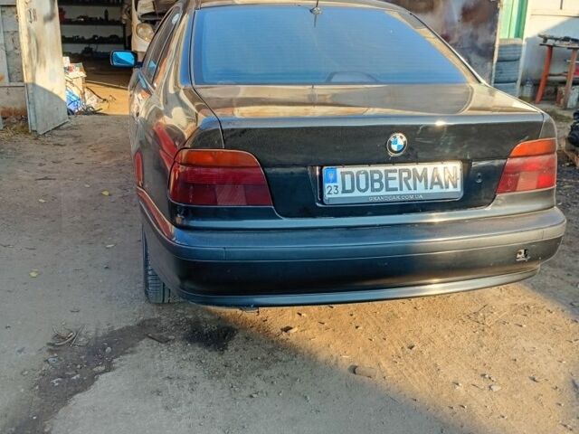 Черный БМВ 5 Серия, объемом двигателя 2.8 л и пробегом 346 тыс. км за 4600 $, фото 5 на Automoto.ua