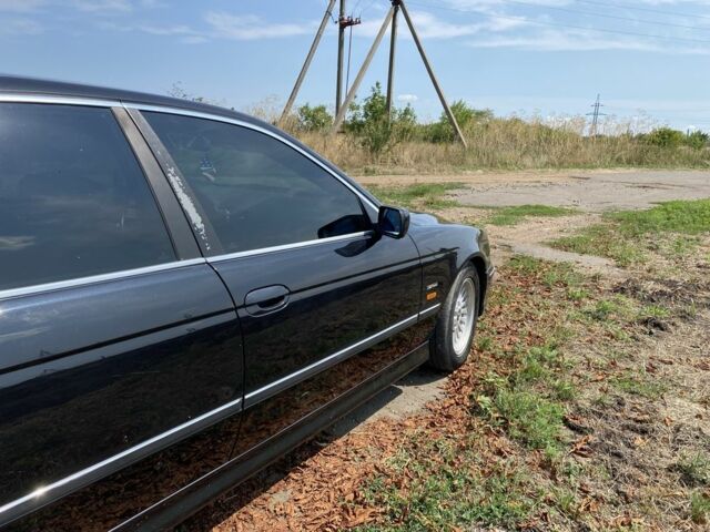 Черный БМВ 5 Серия, объемом двигателя 3 л и пробегом 354 тыс. км за 6000 $, фото 5 на Automoto.ua