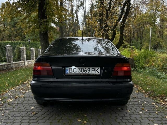 Черный БМВ 5 Серия, объемом двигателя 2.5 л и пробегом 299 тыс. км за 2999 $, фото 5 на Automoto.ua
