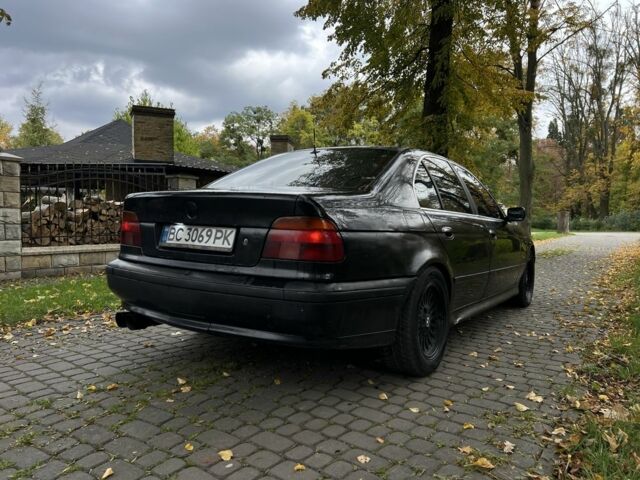 Черный БМВ 5 Серия, объемом двигателя 2.5 л и пробегом 299 тыс. км за 2999 $, фото 4 на Automoto.ua