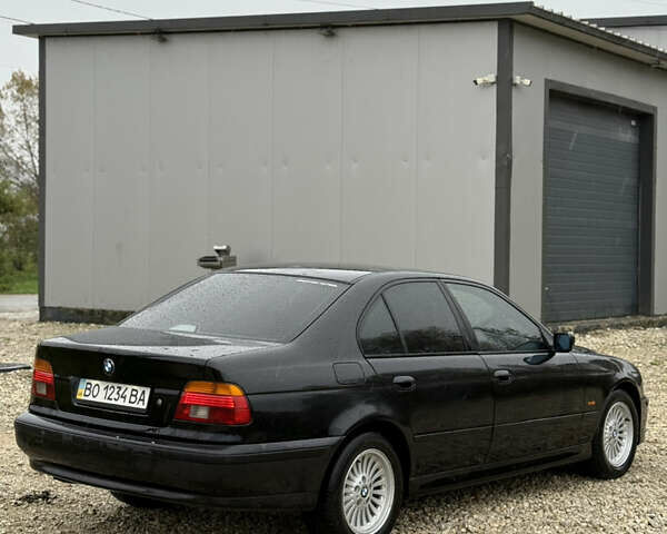 Черный БМВ 5 Серия, объемом двигателя 3 л и пробегом 400 тыс. км за 5950 $, фото 2 на Automoto.ua