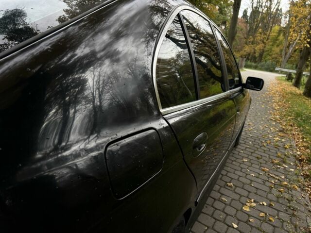 Черный БМВ 5 Серия, объемом двигателя 2.5 л и пробегом 299 тыс. км за 2999 $, фото 12 на Automoto.ua