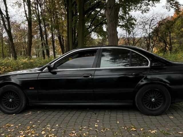 Черный БМВ 5 Серия, объемом двигателя 2.5 л и пробегом 299 тыс. км за 2999 $, фото 7 на Automoto.ua