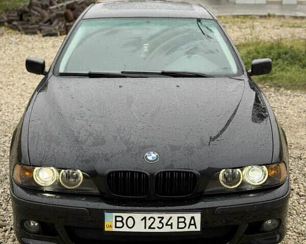 Черный БМВ 5 Серия, объемом двигателя 3 л и пробегом 400 тыс. км за 5950 $, фото 1 на Automoto.ua