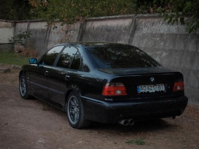 Черный БМВ 5 Серия, объемом двигателя 4.4 л и пробегом 470 тыс. км за 5800 $, фото 1 на Automoto.ua